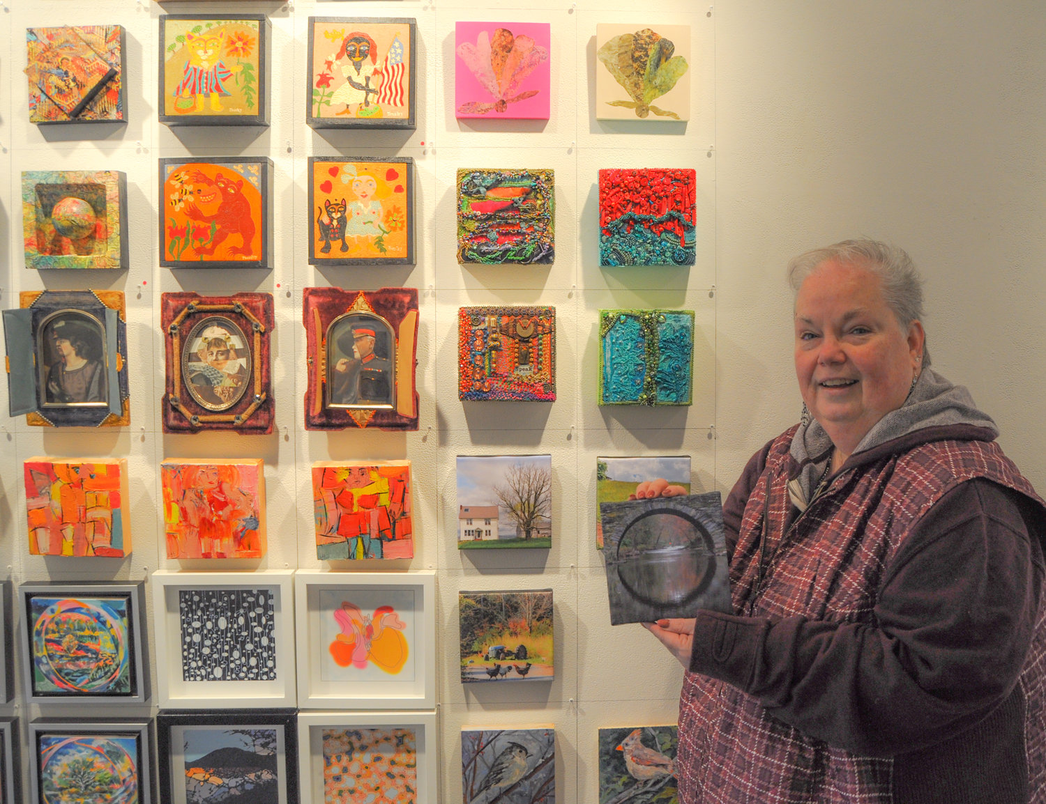 I attended "Art in Sixes" at the DVAA last weekend, in time to catch the River Reporter’s Eileen Hennessy placing a tiny red dot (sold!) next to one of my six-by-six inch photos on canvas. Thanks, Eileen!